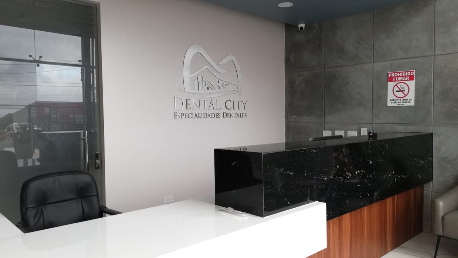 Dental City reception area with branded front desk