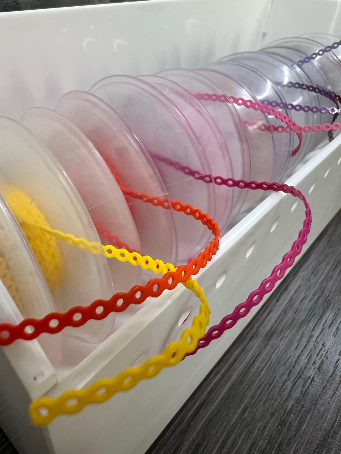 Orthodontic elastics and accessories